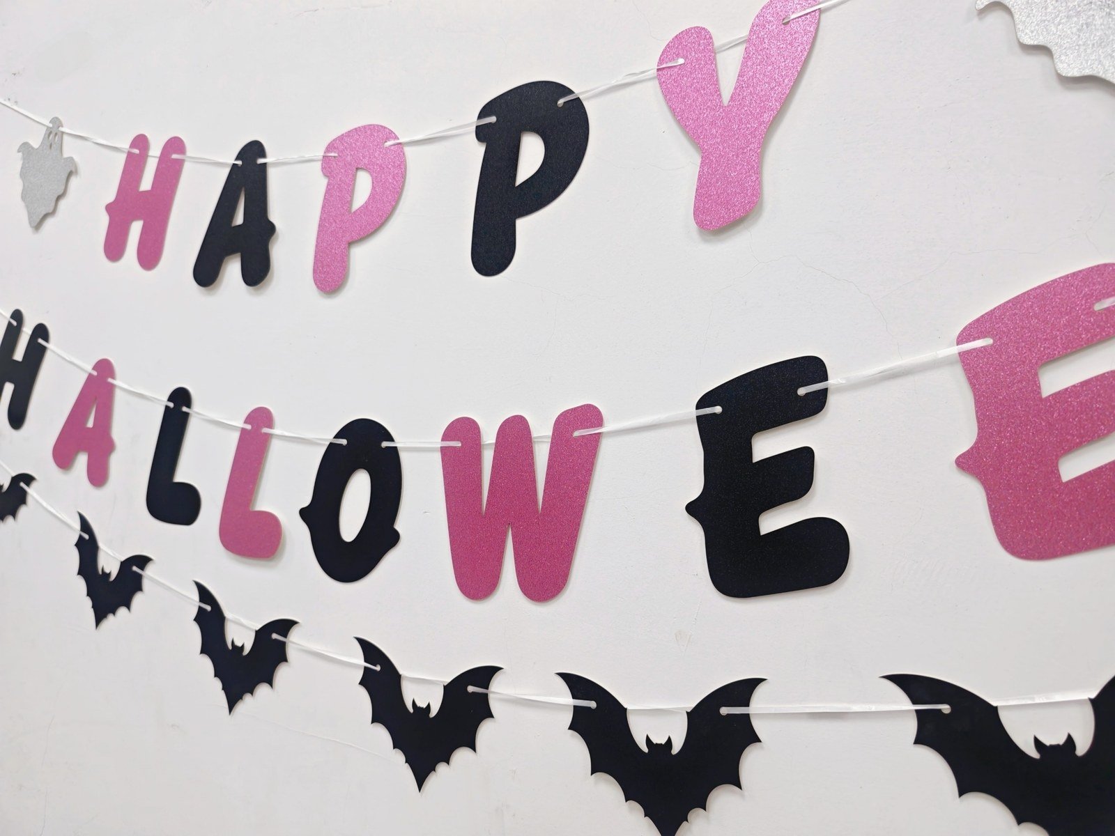 Halloween glitter letter banner with pink and black letters, silver ghosts and black bats — additional view